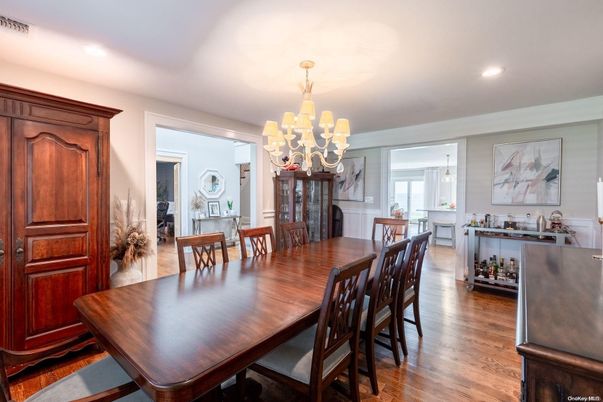 Chandelier, Dining room, Fireplace, Interior, Recessed Lighting, Wood Texture Flooring