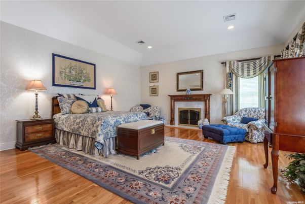 Bedroom, Fireplace, Interior, Recessed Lighting, Wood Texture Flooring