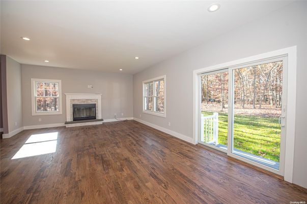 Empty room, Fireplace, Interior, Recessed Lighting, Wood Texture Flooring