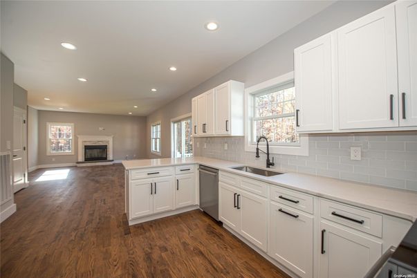 Fireplace, Interior, Kitchen, Recessed Lighting, Wood Texture Flooring