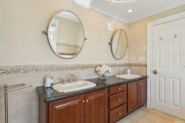 Bathroom, Dual Sink Vanities, Interior, Recessed Lighting, Wood Texture Flooring