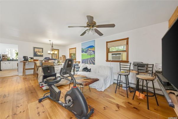 Dining room, Fitness Equipment, Interior, Pendant Lights, Wood Texture Flooring