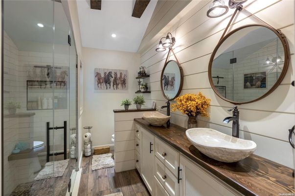 Bathroom, Dual Sink Vanities, Glass Shower, Interior, Recessed Lighting, Wood Texture Flooring