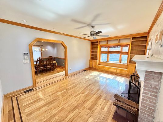 Chandelier, Dining room, Fireplace, Interior, Recessed Lighting, Wood Texture Flooring