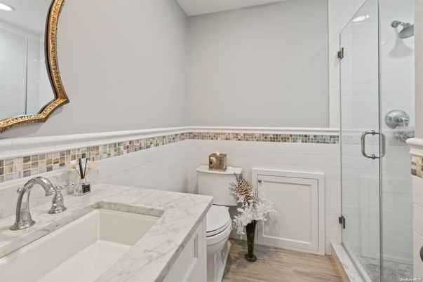Bathroom, Glass Shower, Interior, Recessed Lighting, Wood Texture Flooring