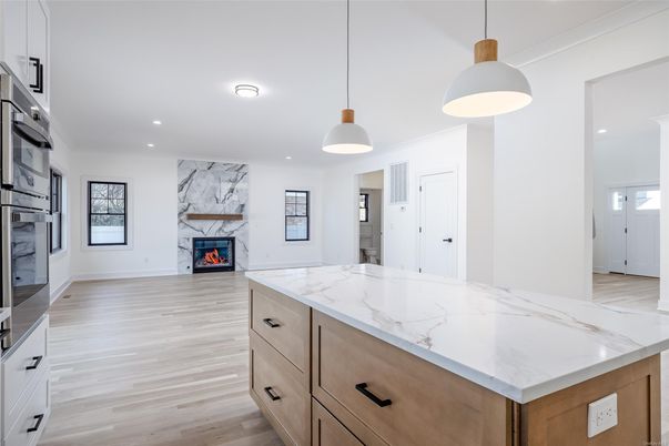 Fireplace, Interior, Kitchen, Pendant Lights, Recessed Lighting, Wood Texture Flooring