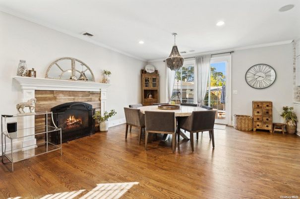Dining room, Fireplace, Interior, Pendant Lights, Recessed Lighting, Wood Texture Flooring