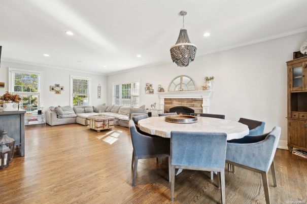 Dining room, Fireplace, Interior, Living room, Pendant Lights, Recessed Lighting, Wood Texture Flooring