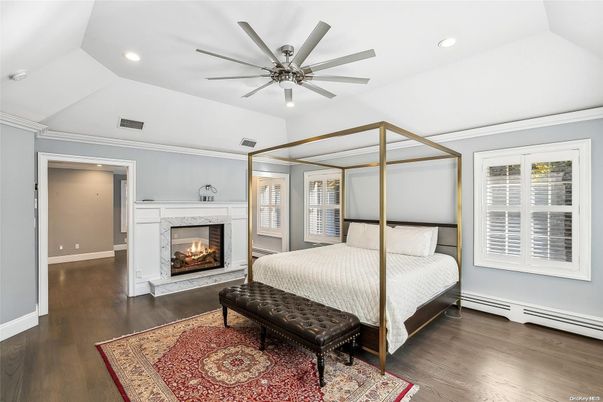 Bedroom, Fireplace, Interior, Recessed Lighting, Wood Texture Flooring