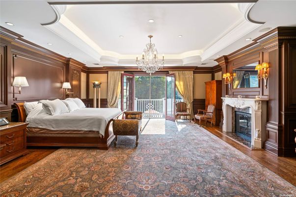 Bedroom, Chandelier, Fireplace, Interior, Recessed Lighting, Wood Texture Flooring