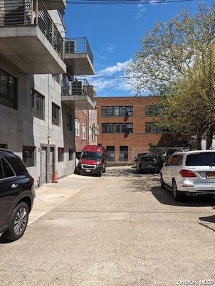 Exterior, Facade, Brick Facade, Condo Building