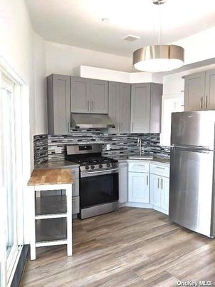 Interior, Kitchen, Pendant Lights, Stainless Steel Appliances, Wood Texture Flooring