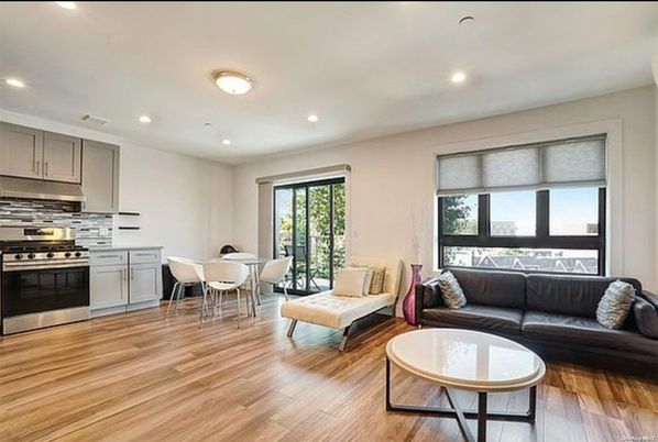 Dining room, Interior, Kitchen, Living room, Recessed Lighting, Stainless Steel Appliances, Wood Texture Flooring