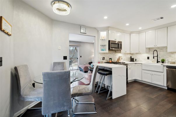 Dining room, Interior, Kitchen, Recessed Lighting, Stainless Steel Appliances, Wood Texture Flooring