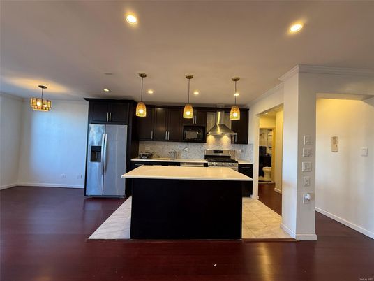 Chandelier, Interior, Kitchen, Pendant Lights, Recessed Lighting, Stainless Steel Appliances, Wood Texture Flooring