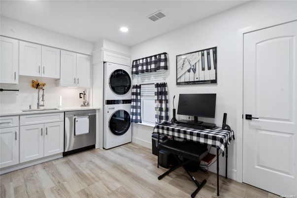 Interior, Kitchen, Recessed Lighting, Washer, Wood Texture Flooring