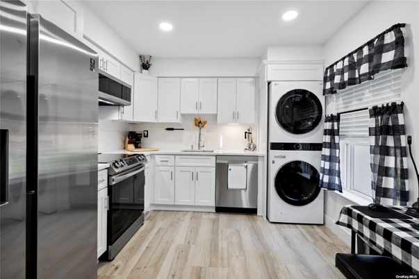 Interior, Kitchen, Recessed Lighting, Stainless Steel Appliances, Washer, Wood Texture Flooring