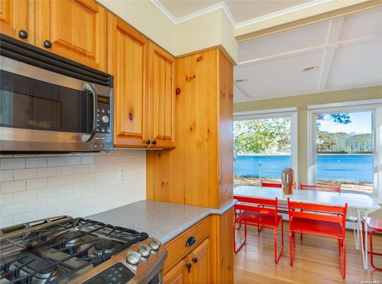 Dining room, Interior, Kitchen, Stainless Steel Appliances, Water, Wood Texture Flooring