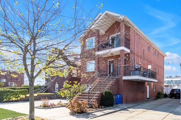 Exterior, Facade, Brick Facade, Condo Building