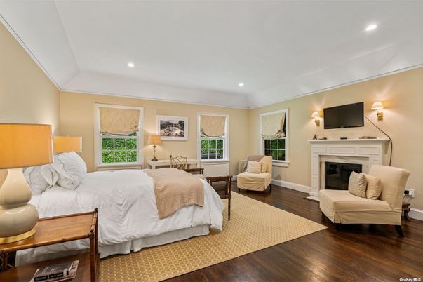 Bedroom, Fireplace, Interior, Recessed Lighting, Wood Texture Flooring
