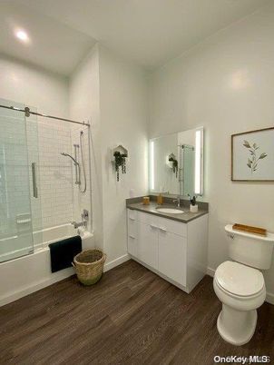 Bathroom, Glass Shower, Interior, Recessed Lighting, Wood Texture Flooring