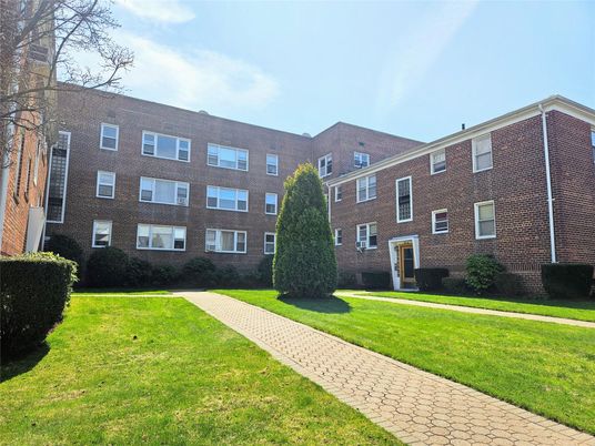 Exterior, Facade, Brick Facade, Condo Building