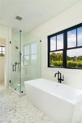 Bathroom, Free Standing Baths, Glass Shower, Interior, Marble, Marble Walls, Recessed Lighting