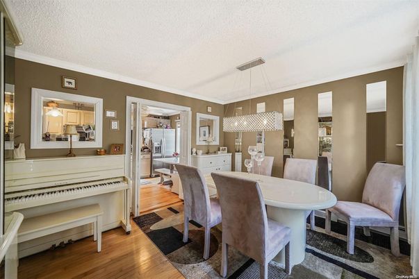 Dining room, Interior, Pendant Lights, Piano, Wood Texture Flooring