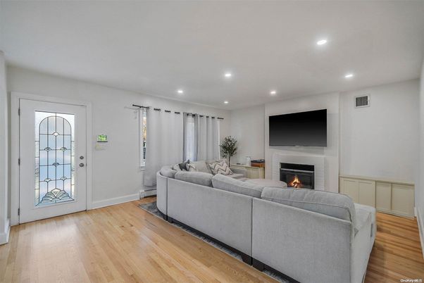Fireplace, Interior, Living room, Recessed Lighting, Wood Texture Flooring