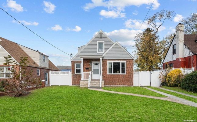 Exterior, Facade, Brick Facade, Cape Cod