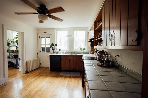 Interior, Kitchen, Tile Countertops, Wood Texture Flooring