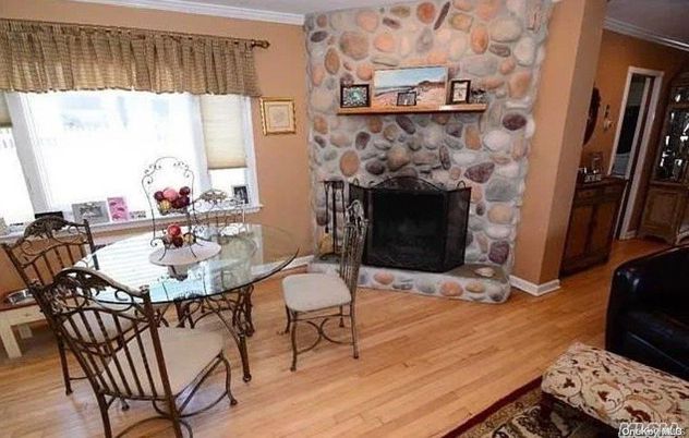 Dining room, Fireplace, Interior, Stone Walls, Wood Texture Flooring