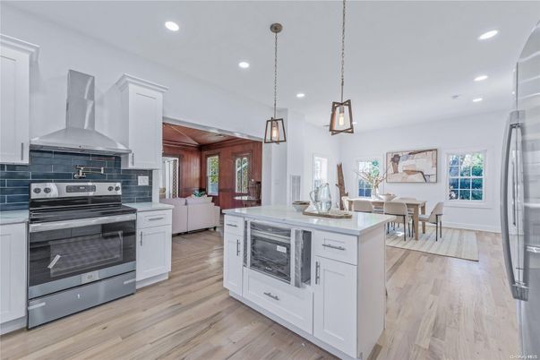 Dining room, Interior, Kitchen, Living room, Pendant Lights, Recessed Lighting, Stainless Steel Appliances, Wood Texture Flooring