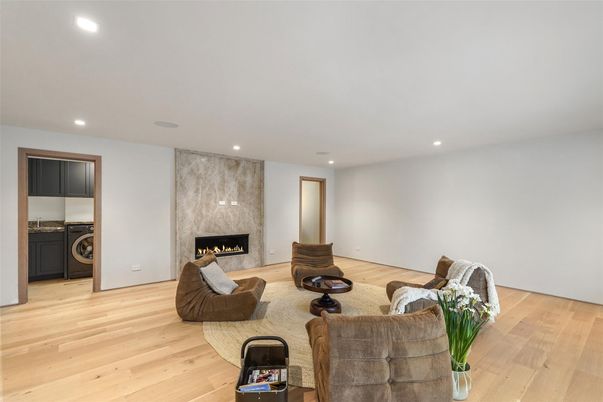 Fireplace, Interior, Living room, Recessed Lighting, Utility Closets, Washer, Wood Texture Flooring