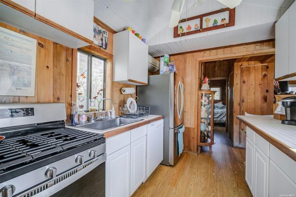 Interior, Kitchen, Tile Countertops, Wood Texture Flooring