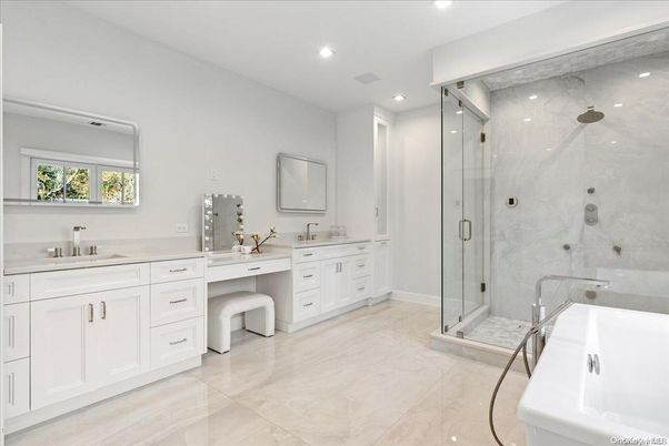 Bathroom, Dual Sink Vanities, Glass Shower, Interior, Marble Walls, Recessed Lighting
