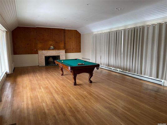 Billiard Table, Fireplace, Game Room, Interior, Recessed Lighting, Wood Texture Flooring, Wooden Walls