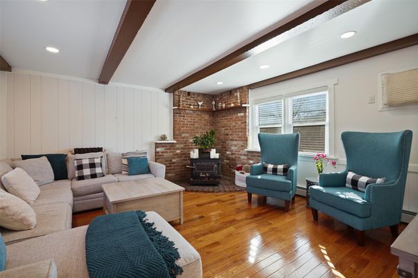 Fireplace, Interior, Living room, Recessed Lighting, Stone Walls, Wooden Beams, Wood Texture Flooring
