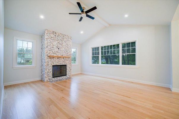 Empty room, Fireplace, Interior, Recessed Lighting, Wood Texture Flooring
