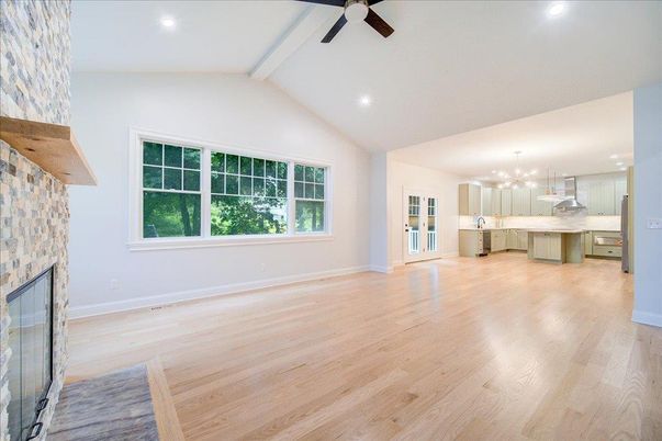 Empty room, Fireplace, Interior, Kitchen, Pendant Lights, Recessed Lighting, Wood Texture Flooring