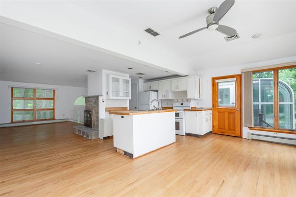 Fireplace, Interior, Kitchen, Recessed Lighting, Wood Texture Flooring