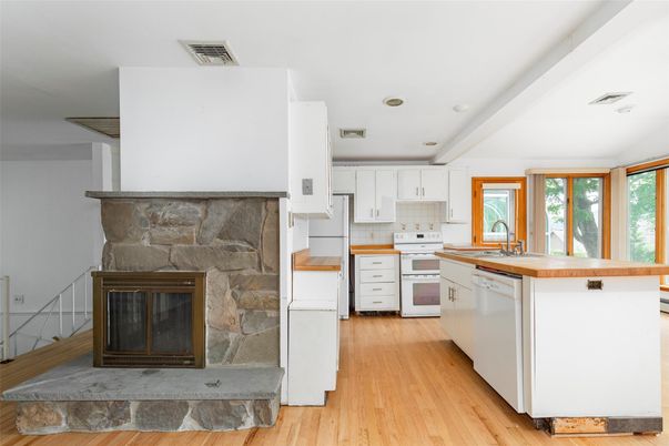 Fireplace, Interior, Kitchen, Recessed Lighting, Wood Texture Flooring