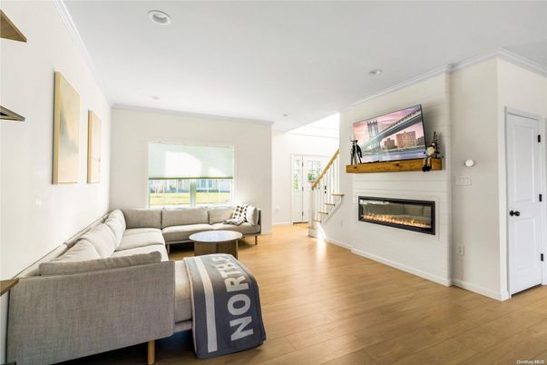 Fireplace, Interior, Living room, Recessed Lighting, Wood Texture Flooring