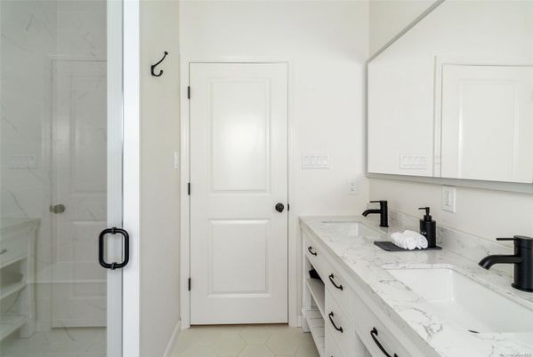 Bathroom, Dual Sink Vanities, Glass Shower, Interior, Marble Walls