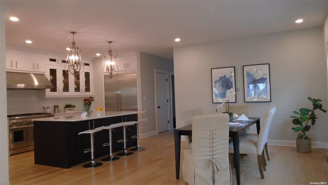 Dining room, Interior, Kitchen, Pendant Lights, Recessed Lighting, Stainless Steel Appliances, Wood Texture Flooring