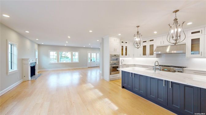 Fireplace, Interior, Kitchen, Pendant Lights, Recessed Lighting, Stainless Steel Appliances, Wood Texture Flooring