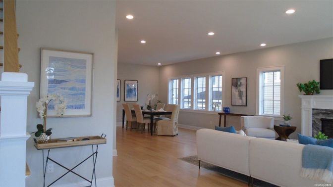 Dining room, Fireplace, Interior, Living room, Recessed Lighting, Wood Texture Flooring