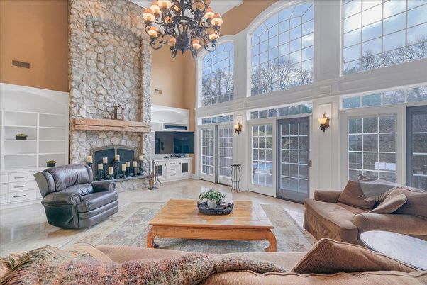 Chandelier, Fireplace, Interior, Living room, Stone Walls