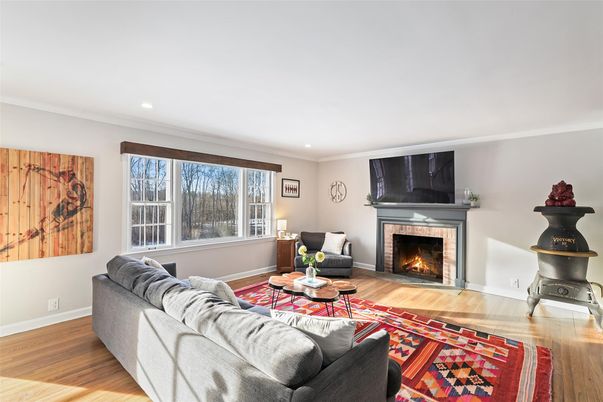 Fireplace, Interior, Living room, Recessed Lighting, Wood Texture Flooring