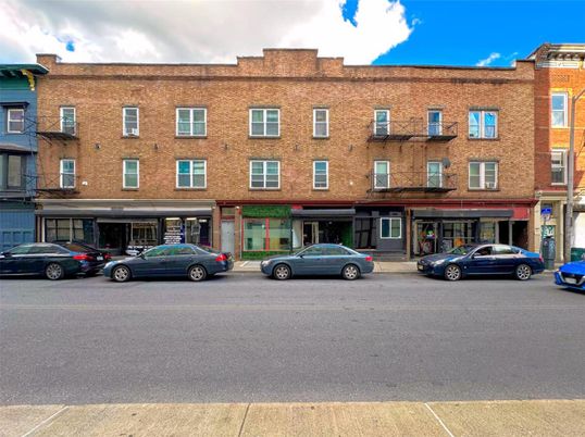 Exterior, Facade, Brick Facade, Condo Building